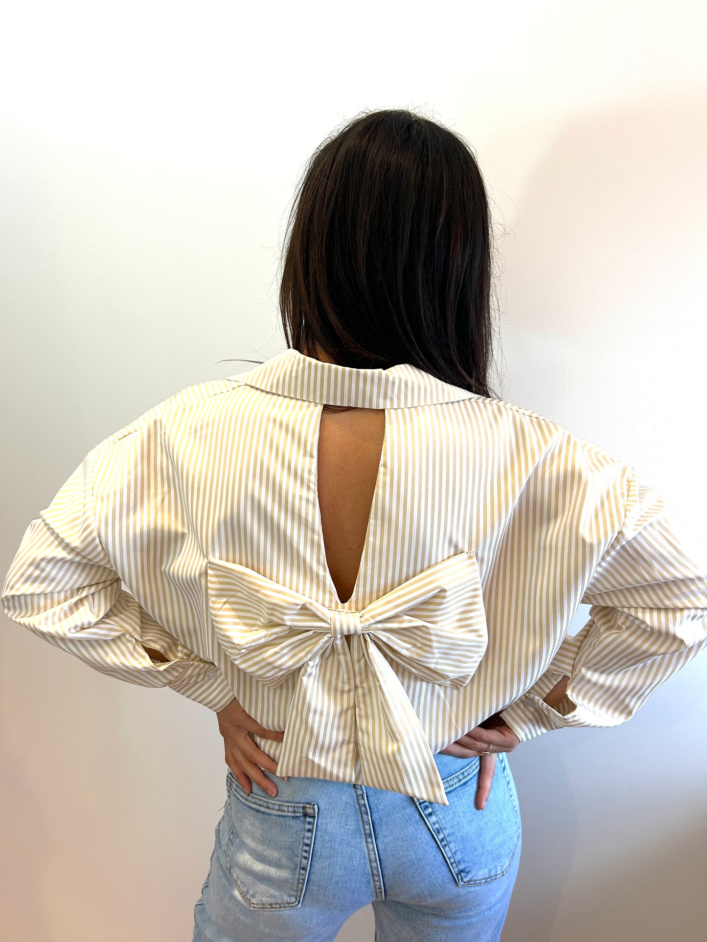 Oversized striped blouse with bow on the back beige