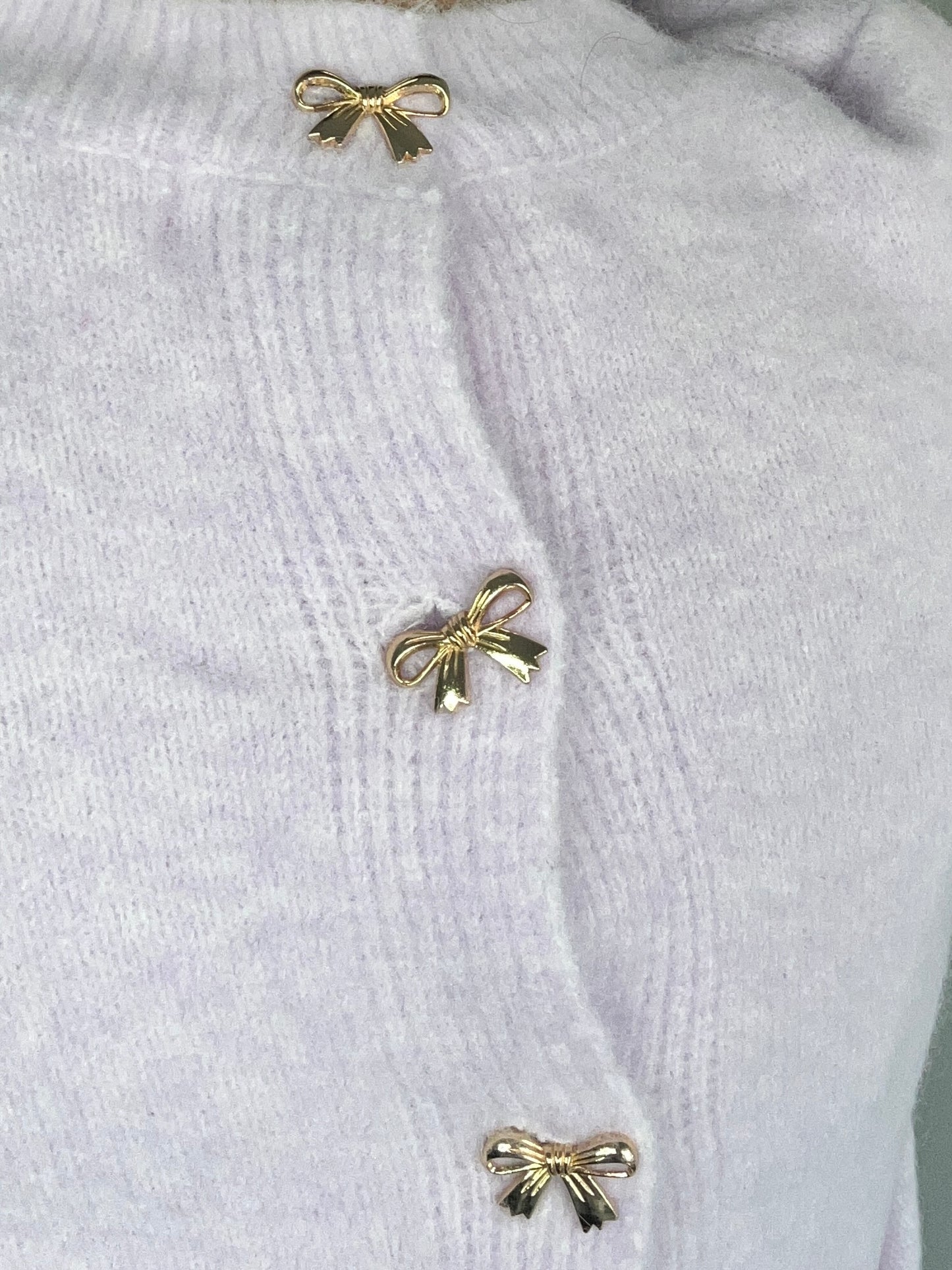 Golden bow sweater