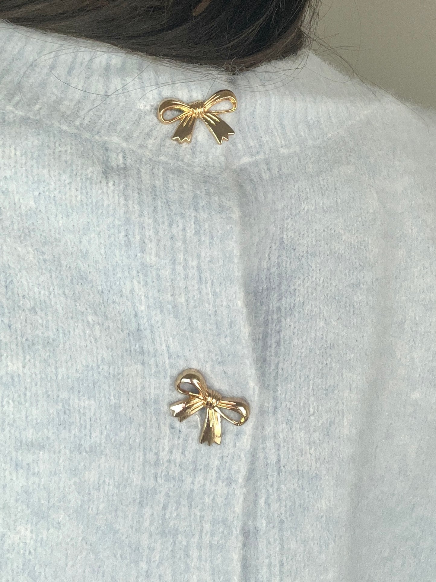 Golden bow sweater